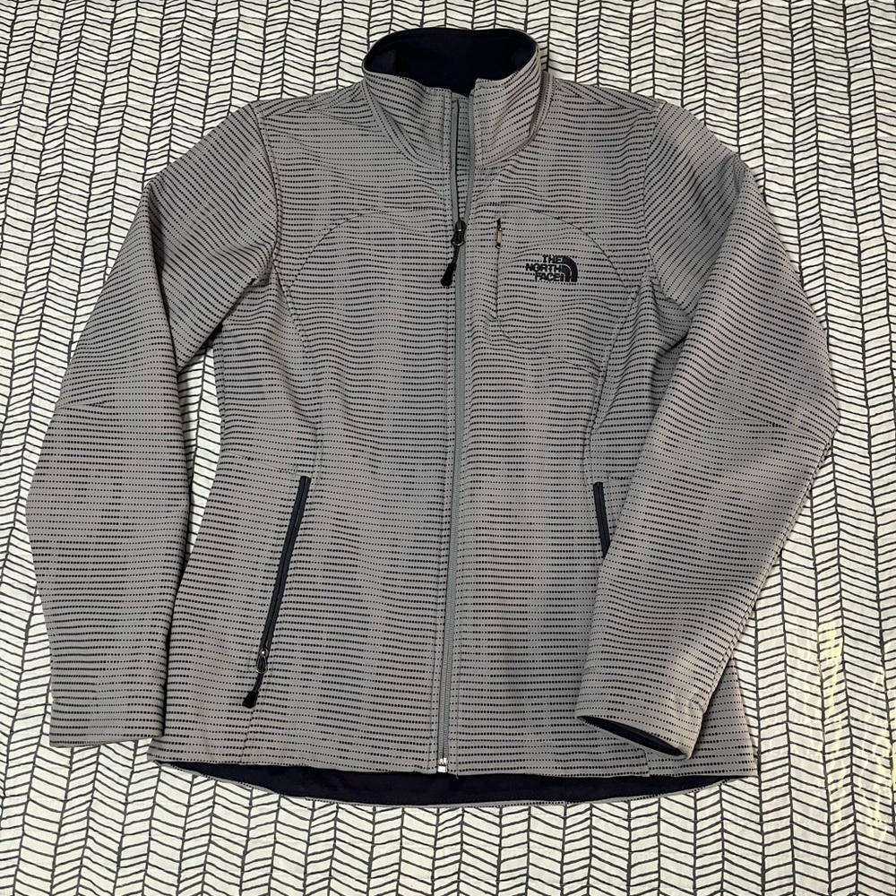 Women’s North Face Apex jacket. Light gray with a pastel gray/purple dot design.